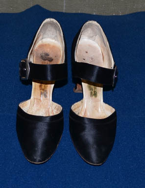 pair%20of%20black%20silk%20covered%20high%20heel%20shoes%20with%20a%20strap%20across%20ankle